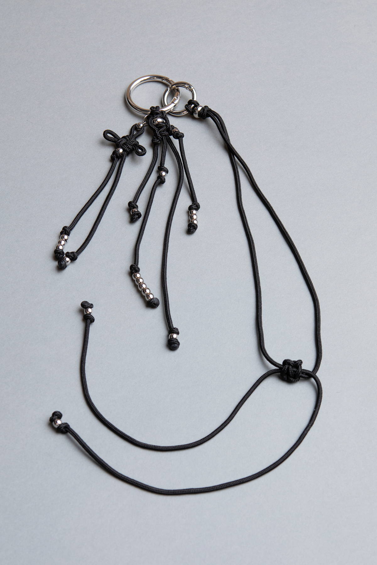 Black statement piece keychain, phone case holder