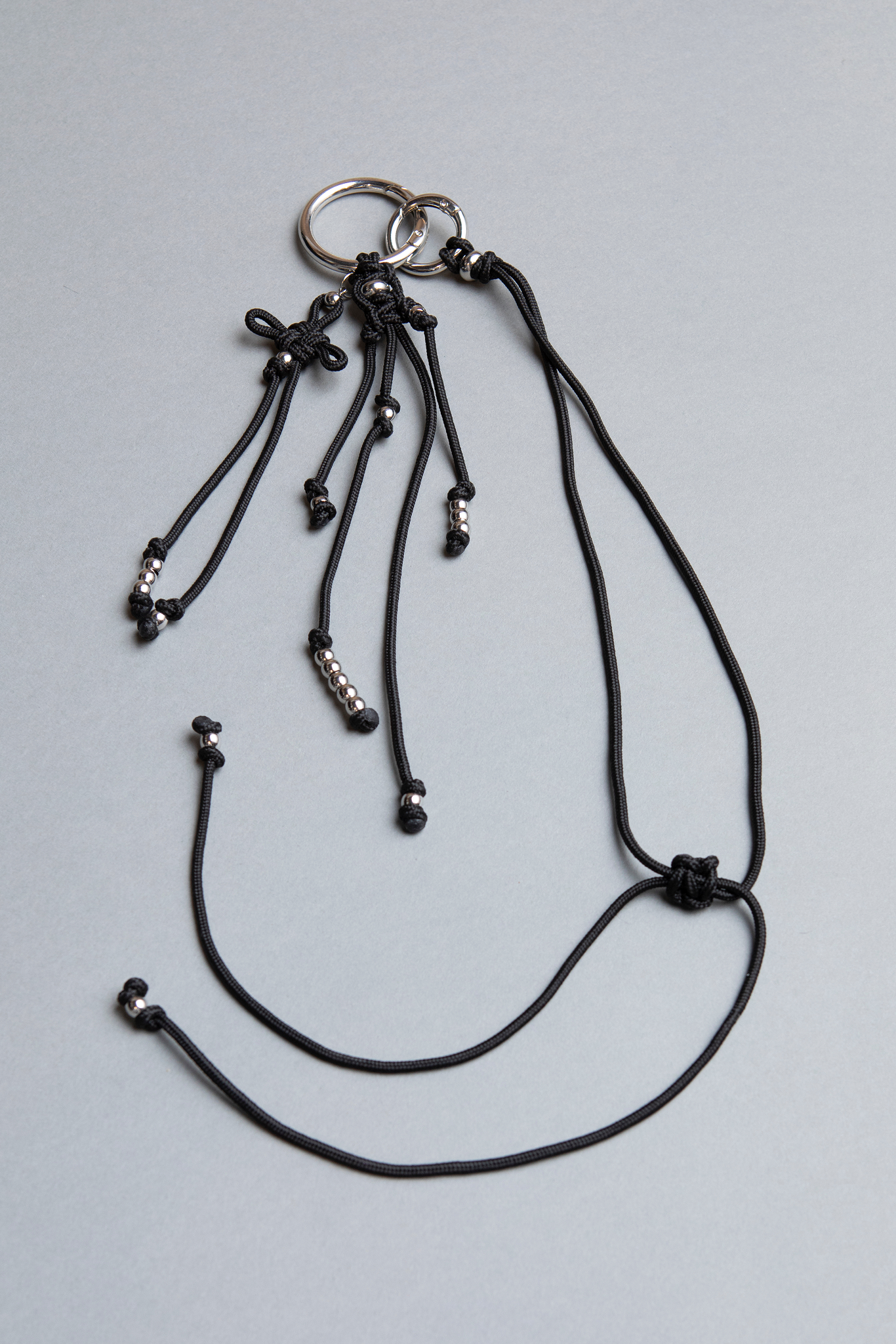 Black statement piece keychain, phone case holder