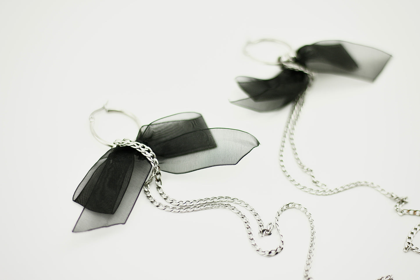 Black bow chain earrings